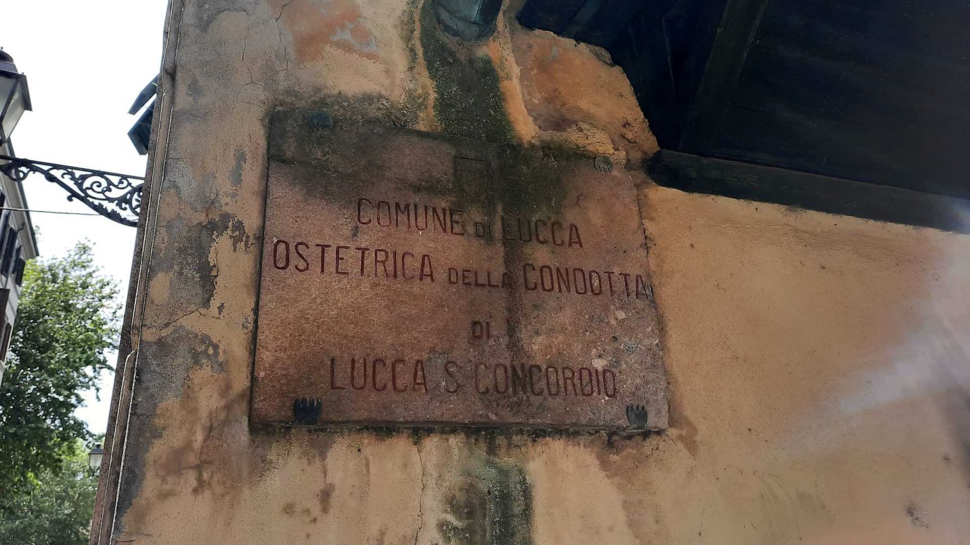 Municipal midwife's workplace signboard, Lucca - 02.jpg